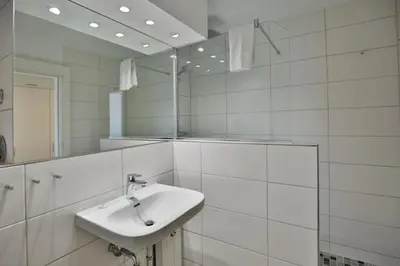 Ein Badezimmer in der Unterkunft Hohe Worth, H304