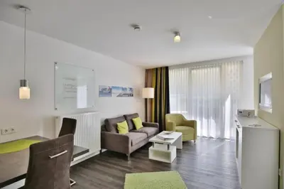 Ein Sitzbereich in der Unterkunft Duhner Strandhus, S3