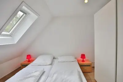 Ein Bett oder Betten in einem Zimmer der Unterkunft Seemöwe, SM11