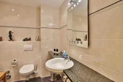 Ein Badezimmer in der Unterkunft Nordseeblick, NB3