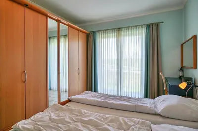 Ein Bett oder Betten in einem Zimmer der Unterkunft Nordseeblick, NB3