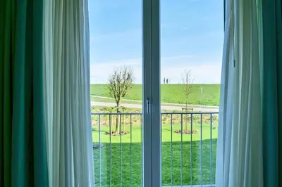 Ein Balkon oder eine Terrasse in der Unterkunft Nordseeblick, NB3