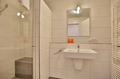 Ein Badezimmer in der Unterkunft Admiralsgarten, AG11b
