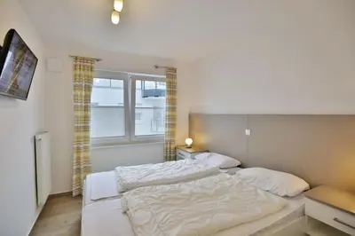 Ein Bett oder Betten in einem Zimmer der Unterkunft Admiralsgarten, AG11b