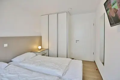 Ein Bett oder Betten in einem Zimmer der Unterkunft Admiralsgarten, AG11b