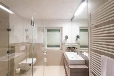 Ein Badezimmer in der Unterkunft Duhner Brandung, B1