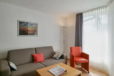 Ein Sitzbereich in der Unterkunft Hohe Worth, H8