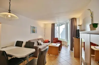 Ein Sitzbereich in der Unterkunft Hohe Worth, H8