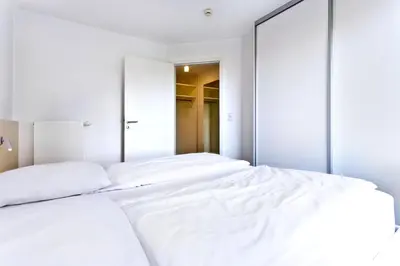 Ein Bett oder Betten in einem Zimmer der Unterkunft Alte Liebe, RA106
