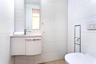 Ein Badezimmer in der Unterkunft Alte Liebe, RA106