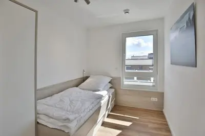 Ein Bett oder Betten in einem Zimmer der Unterkunft Windjammer, WJ10
