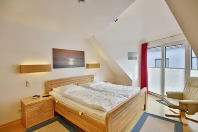 Ein Bett oder Betten in einem Zimmer der Unterkunft Seemöwe, SM9