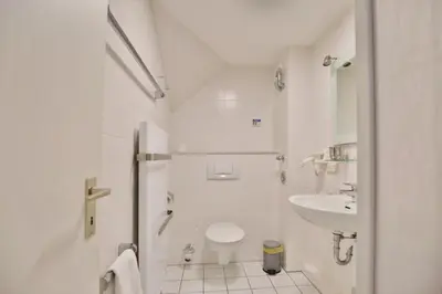 Ein Badezimmer in der Unterkunft Seemöwe, SM9