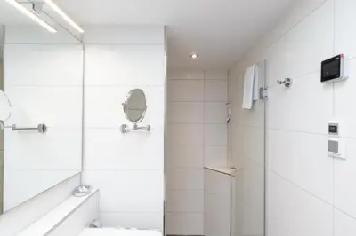 Ein Badezimmer in der Unterkunft Admiralsgarten, AG16b