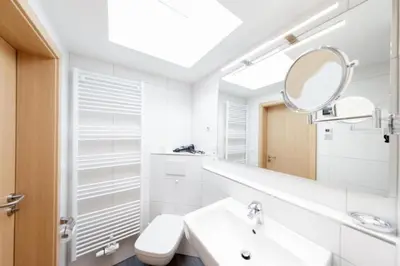 Ein Badezimmer in der Unterkunft Admiralsgarten, AG16b