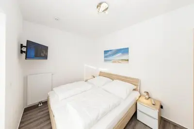 Ein Bett oder Betten in einem Zimmer der Unterkunft Admiralsgarten, AG16b
