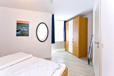 Ein Bett oder Betten in einem Zimmer der Unterkunft Seemöwe, SM5