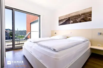 Ein Bett oder Betten in einem Zimmer der Unterkunft Alte Liebe, RA308