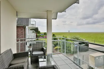 Ein Balkon oder eine Terrasse in der Unterkunft Dünenweg 37, DW2