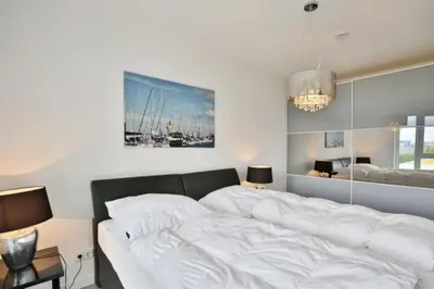 Ein Bett oder Betten in einem Zimmer der Unterkunft Kapitän Alexander, KA47