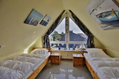 Ein Bett oder Betten in einem Zimmer der Unterkunft Bernstein, BS5