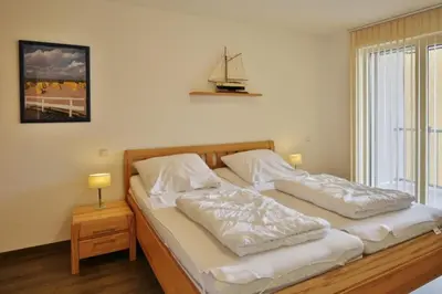 Ein Bett oder Betten in einem Zimmer der Unterkunft Am Seedeich 14, AS5