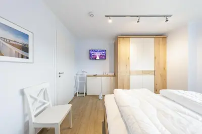 Ein Bett oder Betten in einem Zimmer der Unterkunft Admiralsgarten, AG9b