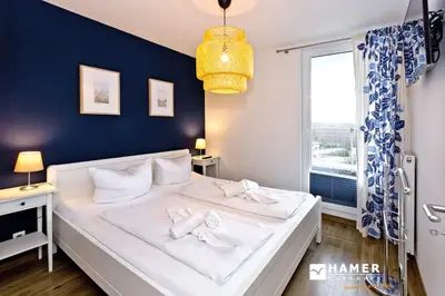 Ein Bett oder Betten in einem Zimmer der Unterkunft Hohe Lith, HL415
