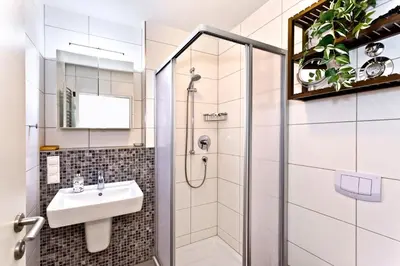Ein Badezimmer in der Unterkunft Hohe Lith, HL415