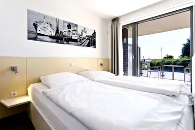 Ein Bett oder Betten in einem Zimmer der Unterkunft Alte Liebe, RA109