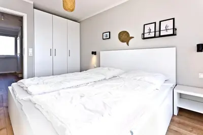 Ein Bett oder Betten in einem Zimmer der Unterkunft City Marina, CM16b