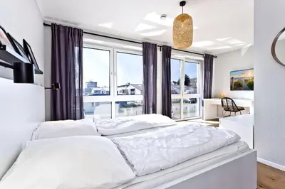 Ein Bett oder Betten in einem Zimmer der Unterkunft City Marina, CM16b