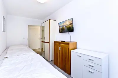 Ein Bett oder Betten in einem Zimmer der Unterkunft Duhner Brise, DB16