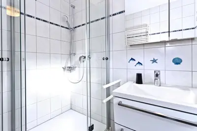 Ein Badezimmer in der Unterkunft Duhner Brise, DB16