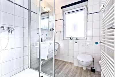 Ein Badezimmer in der Unterkunft Duhner Brise, DB16