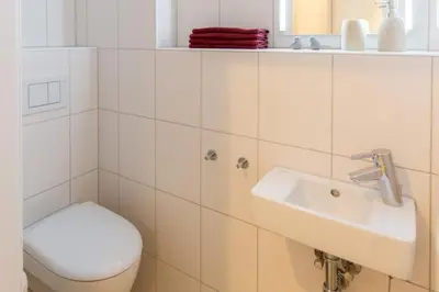 Ein Badezimmer in der Unterkunft Am Seedeich 14, AS7