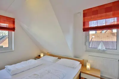 Ein Bett oder Betten in einem Zimmer der Unterkunft Ruge Bries, RB9