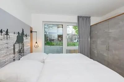 Ein Bett oder Betten in einem Zimmer der Unterkunft Nordstrand, N101a