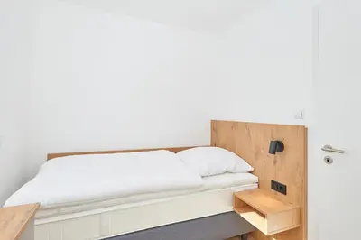 Ein Bett oder Betten in einem Zimmer der Unterkunft Nordstrand, N101a