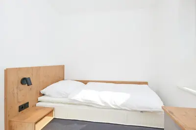 Ein Bett oder Betten in einem Zimmer der Unterkunft Nordstrand, N101a