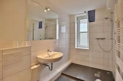 Ein Badezimmer in der Unterkunft Hohe Worth, H1