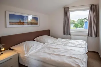 Ein Bett oder Betten in einem Zimmer der Unterkunft Ferienhaus 
