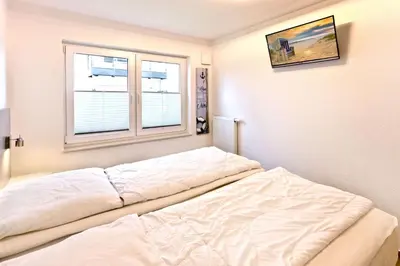 Ein Bett oder Betten in einem Zimmer der Unterkunft Admiralsgarten, AG2s