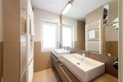 Ein Badezimmer in der Unterkunft Duhner Brandung, B8