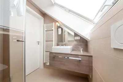 Ein Badezimmer in der Unterkunft Duhner Brandung, B8