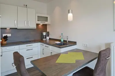 Küche/Küchenzeile in der Unterkunft Duhner Strandhus, S303