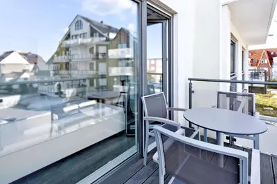 Ein Balkon oder eine Terrasse in der Unterkunft Duhner Brandung, B12