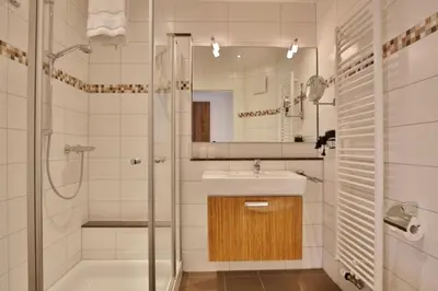 Ein Badezimmer in der Unterkunft Wattwagen, RW2