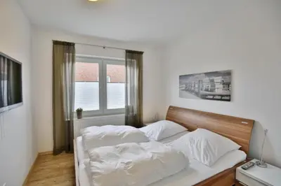 Ein Bett oder Betten in einem Zimmer der Unterkunft Dunamar, DM1