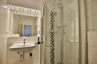 Ein Badezimmer in der Unterkunft Hohe Worth, H411